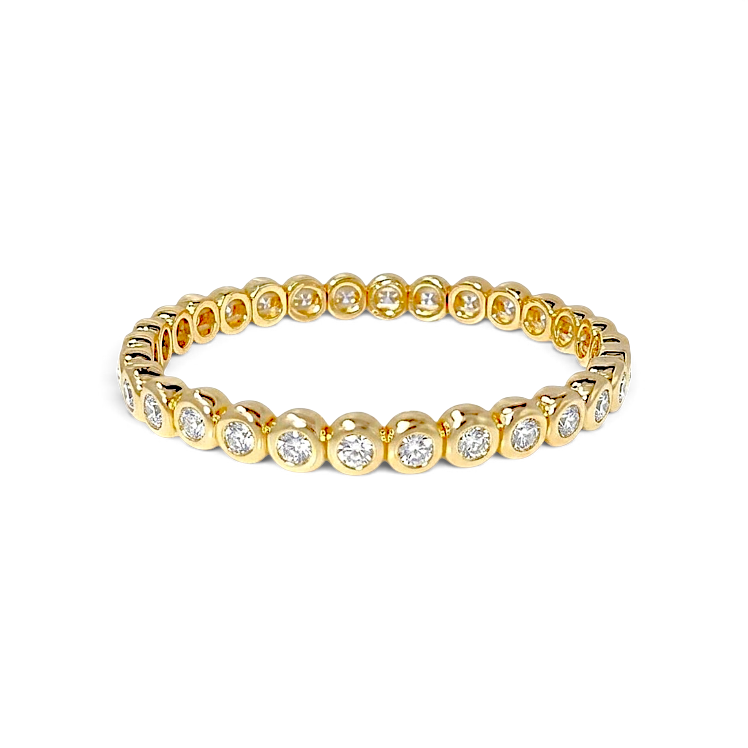 Ruchy bezel bangle in 18k gold plated brass with clear stones