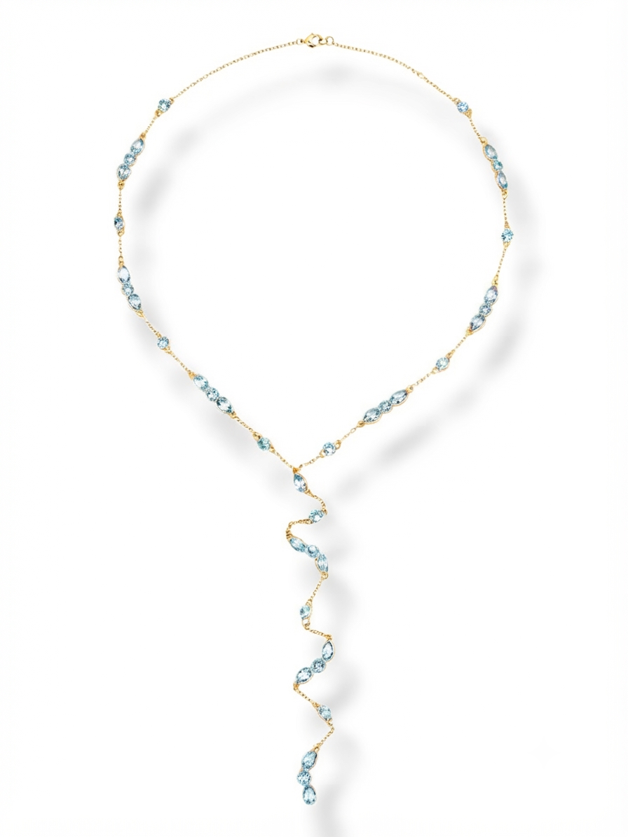 Cascata Lariat in 925 Sterling Silver with 18k gold plating — bezel-set stones on a fine chain with a spiraling front drop