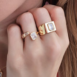 Ring Emeral Cut CZs – 18k Gold Plated | Open Front Collection